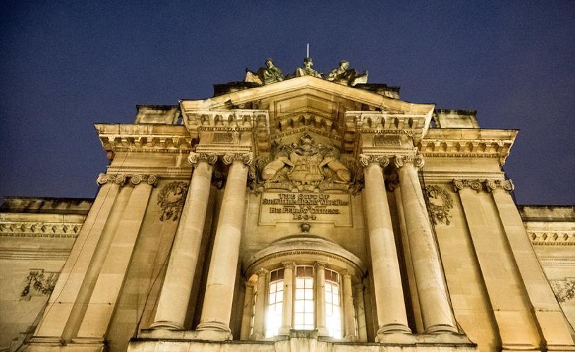 Exterior of Bristol Museum and Art Gallery lit up in the evening